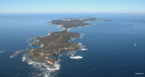 Rottnest Island taken from the west. The mainland can be seen in the background.