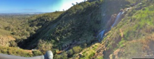 My attempt at a panorama with my iPhone. Pity about the light. Lesmurdie Falls with view towards Perth city and the coast.
